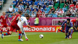 Greece's Fanis Gekas scores after an error from goalkeeper Petr Cech