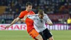 Mark van Bommel tackles Lukas Podolski, Netherlands v Germany, Euro 2012, Metalist Stadium, June 13, 2012
