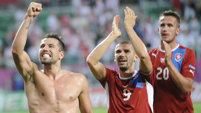 Milan Baros, Jan Rezek and Tomas Pekhart celebrate victory over Poland