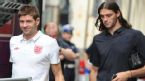 England's Steven Gerrard and Andy Carroll leave their team hotel for a training session, Krakow, Poland, June 23, 2012