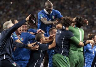 Italy players celebrate after Alessandro Diamanti scored the decisive penalty in the shootout
