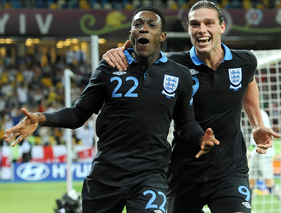 Danny Welbeck and Andy Carroll celebrate the winner
