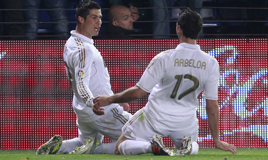 Alvaro Arbeloa controls the ball against China
