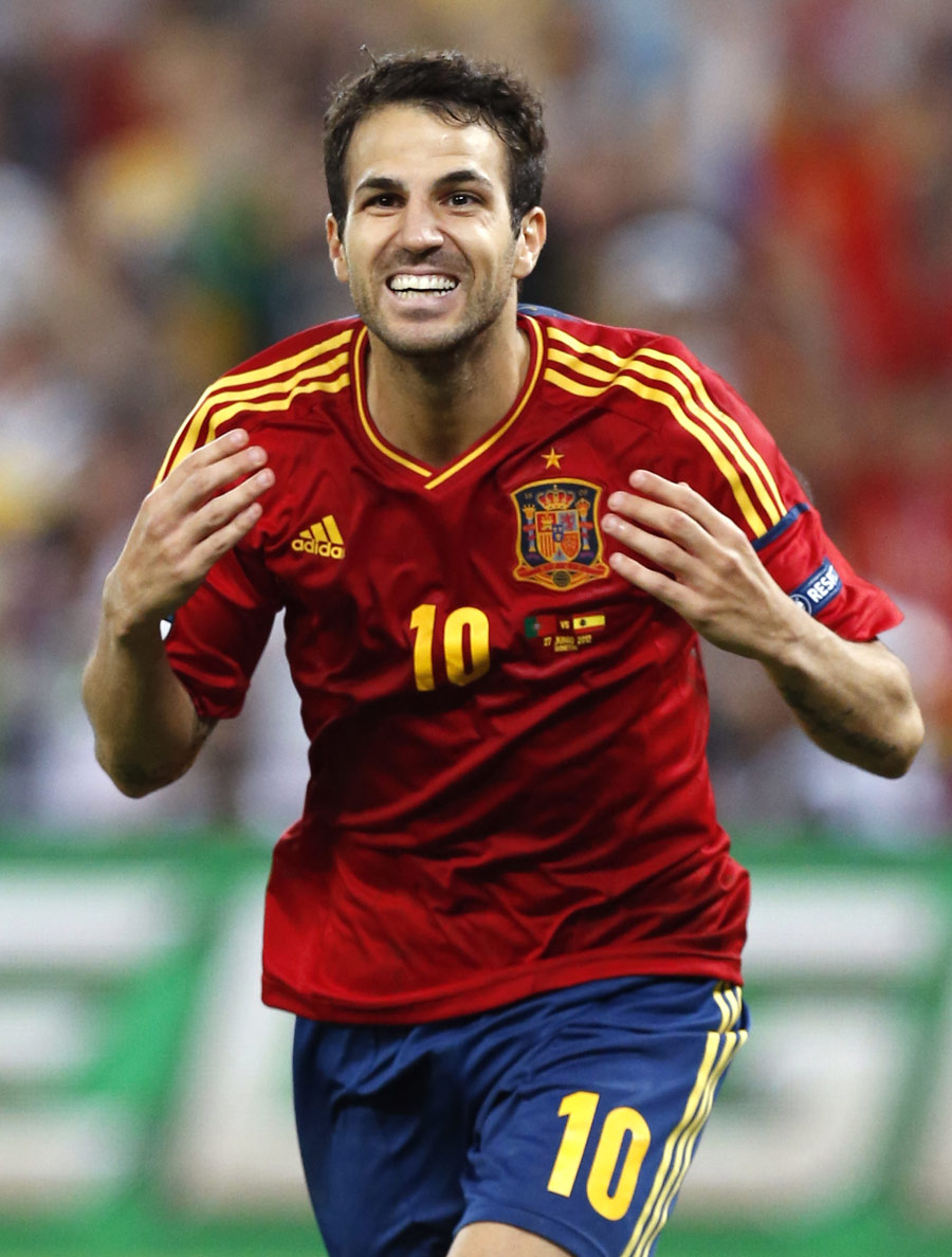 Cesc Fabregas of Spain celebrates scoring the winning penalty