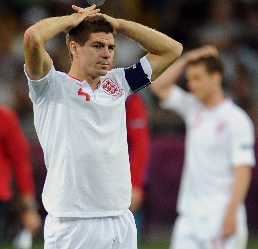 Steven Gerrard consoles Ashley Cole after England's defeat to Italy