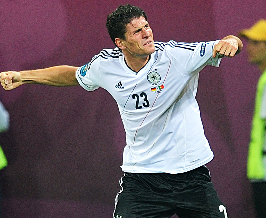 Mario Gomez celebrates scoring a goal for Germany against Portugal 100612