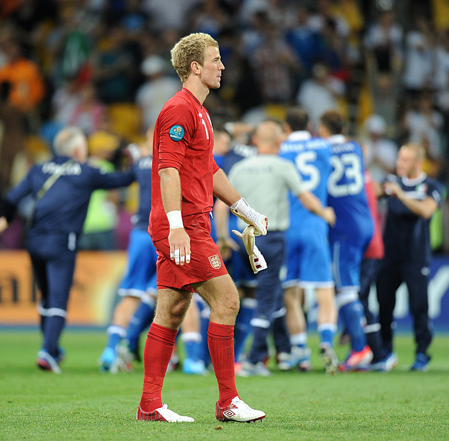 Joe Hart trudges off disconsolately after the penalty defeat to Italy