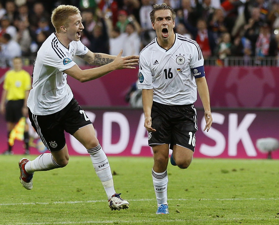 Germany's Philipp Lahm celebrates his goal with Marco Reus