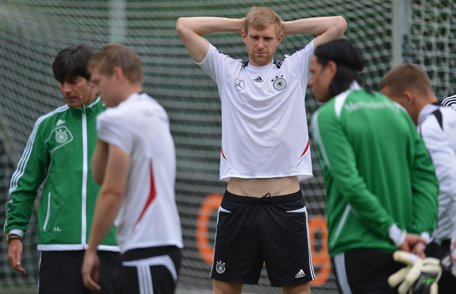 Per Mertesacker takes part in Germany's training session