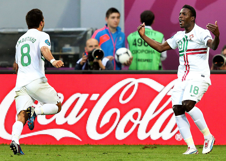 Joao Moutinho celebrates a goal with Silvestre Varela against Denmark
