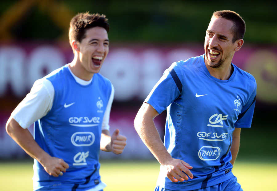 Samir Nasri and Franck Ribery take part in a training session