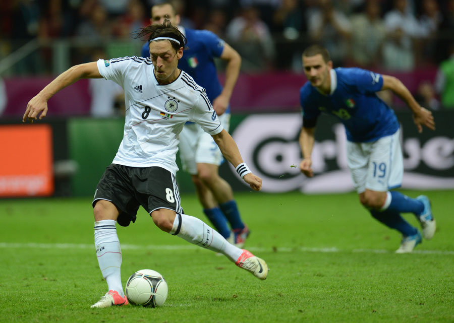 German midfielder Mesut Ozil scores a penalty late on, but it was too late