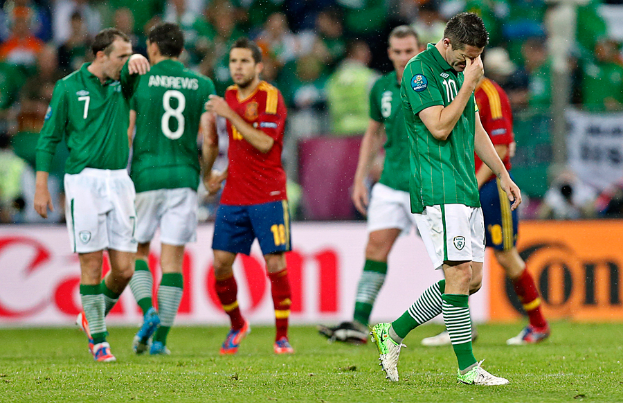 Ireland's Robbie Keane leaves the pitch dejected following defeat to Spain