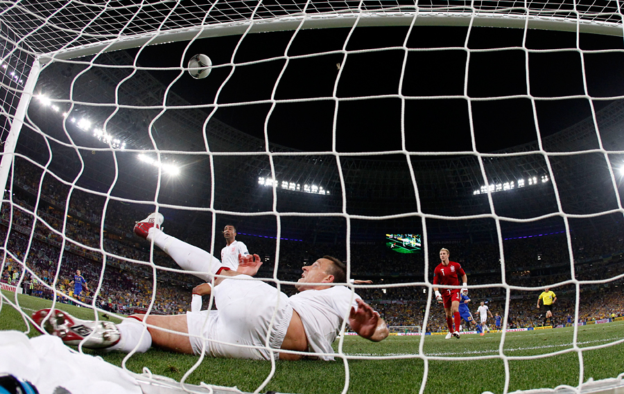 England's John Terry clears the ball off the line against Ukraine